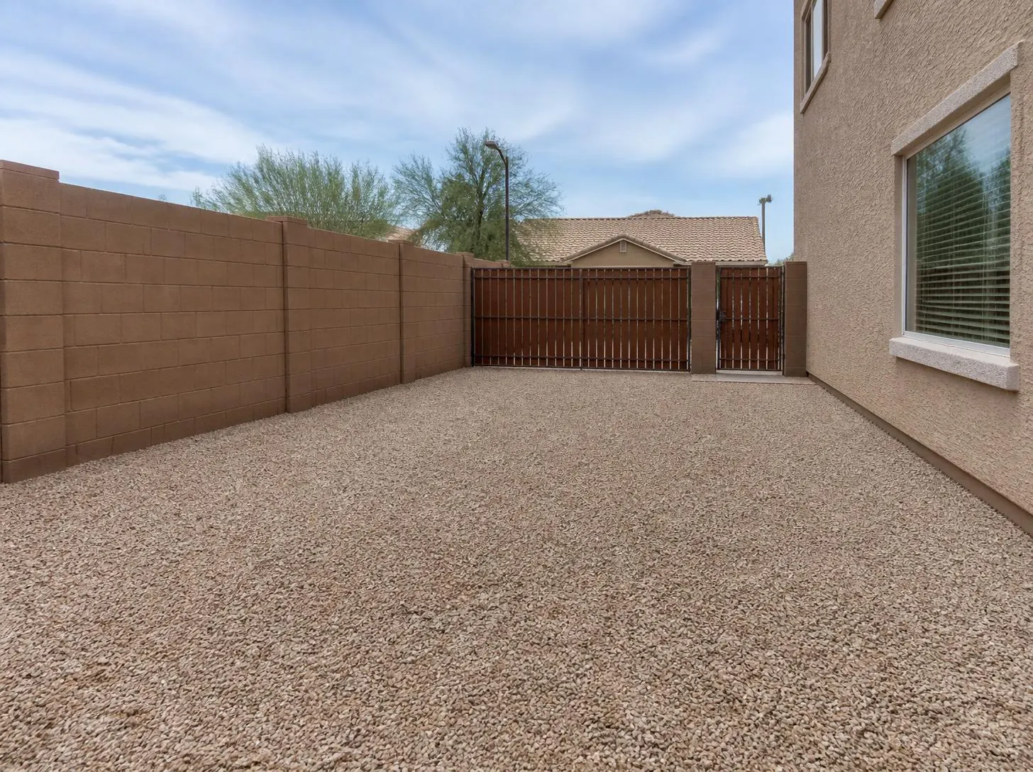 An empty rental backyard ready for move in